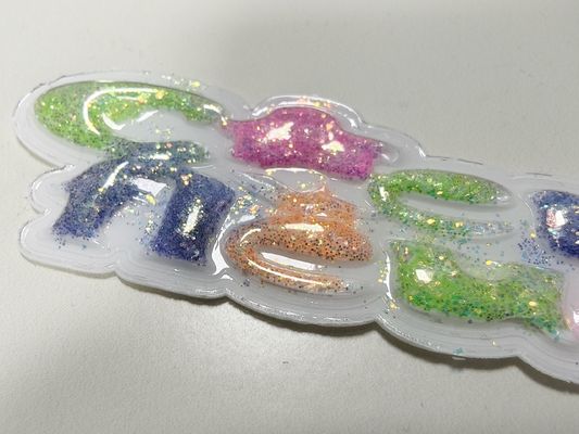 Nhãn hiệu TPU màu vàng màu hồng sôi nổi được tùy chỉnh cho quần áo